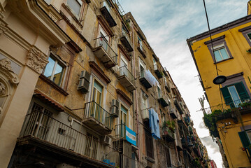 Fototapeta na wymiar Typical street with houses in Italy.