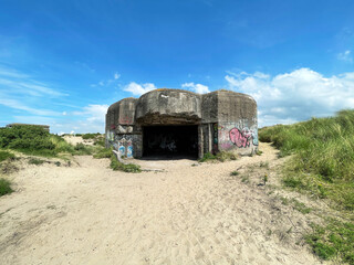 Old military bunker on the coast of Ijmuiden, Netherlands - 588379623