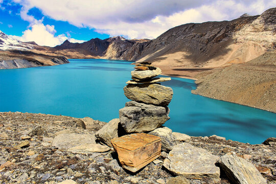 The deep luminescent blue of one of the highest lakes in the world - Tilicho Lake at 4910 meters above sea level, just below Tilicho peak, on the Annapurna circuit trek  in central Nepal
