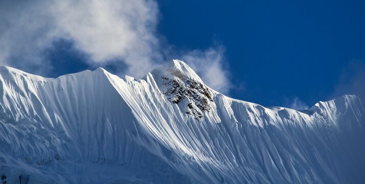 Khangsar Kang, 7485 meters, also called Roc Noir is visible over the Tilicho lake trail