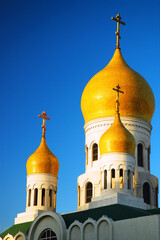 The yellow onion domes are a distinctive architecture feature of the Russian Orthodox church, here Holy Virgin Cathedral in San Francisco, 
