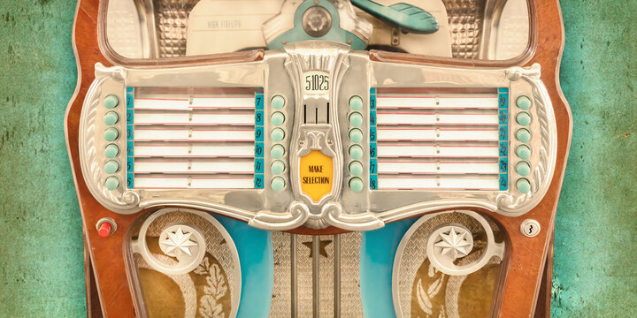 Vintage colorful jukebox in front of a weathered background