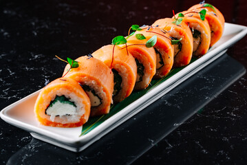 set of sushi roll in plate