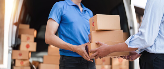 Home delivery service and working service mind. Man customer hand receiving a cardboard boxes...