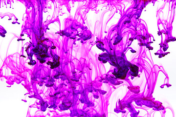 Abstract background picture with purple ink dissolving in water 