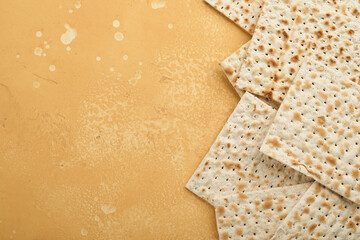 Passover Pesah celebration concept. Matzah, kosher red wine, walnut and white and yellow roses....