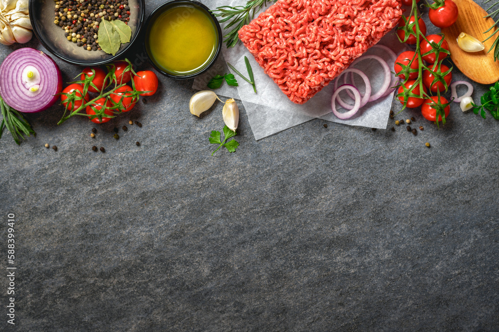 Poster ingredients for cooking. food background with fresh minced meat, spices, olive oil and vegetables on