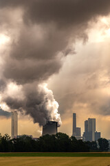 Power plant factory chimney emissions causing air pollution. - 588400492