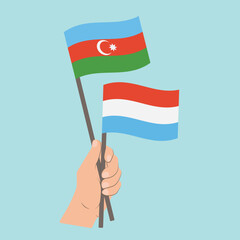 Flags of Azerbaijan and Luxembourg, Hand Holding flags