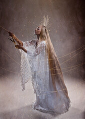 Goddess of fate moira with scissors is preparing to cut the thread of life. Ancient mythology