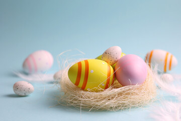 Easter eggs on a colored background, festive background 