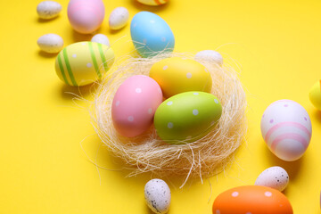 Easter eggs on a colored background, festive background 