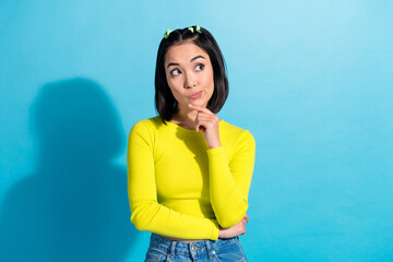 Photo of young funny attractive korean lady touch chin thoughtful about her future business brand...