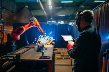 Engineer control smart robot welding arm system.