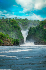 The Murchison Falls in Murchison Falls National Park with a rainbow in Uganda Africa 