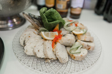 appetizer food delicacy stuffed fish on a festive table in a restaurant