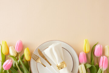 Mother's Day atmosphere concept. Top view photo of circle plate with cutlery knife fork and napkin...