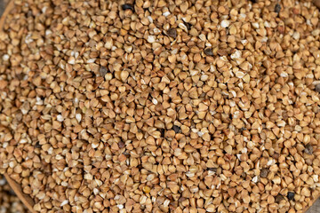 Poorly cleaned buckwheat groats for cooking porridge