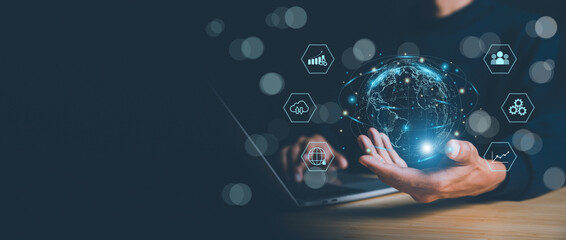 ฺBusinessman holding Global network connection. Big data analytics and business intelligence concept. World map point and line composition concept of global business.