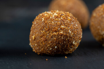 delicious round chocolate candy made of cocoa and sugar