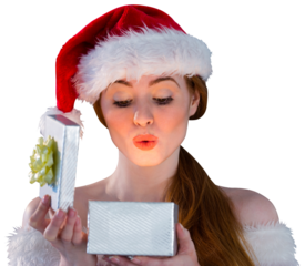 Sexy girl in santa costume opening a gift