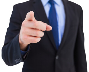 Businessman pointing his finger at camera