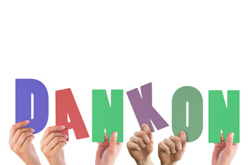 Cropped hands holding colorful alphabets