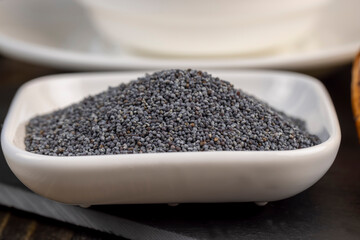 A large number of poppy seeds on the cooking table