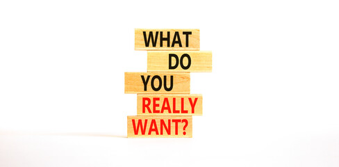 What do you really want symbol. Concept words What do you really want on wooden block. Beautiful white table white background. Business and what do you really want concept. Copy space.