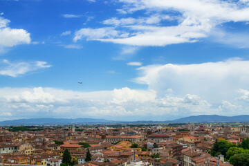 Fototapeta na wymiar The sky over the roofs in Pisa