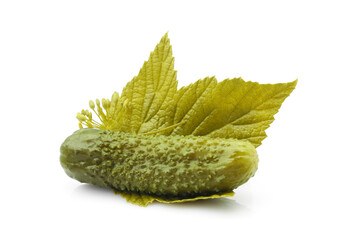 Marinated pickled cucumber with currant leaf and dill isolated on white background