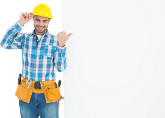 Happy repairman pointing towards blank billboard