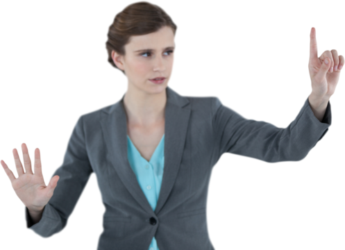 Businesswoman with arms raised while using invisible digital screen - Powered by Adobe