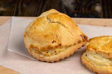 Sweet pastries made of shortbread dough and white cheese fillings