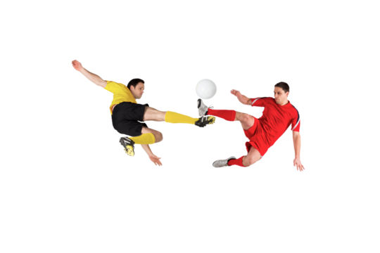 Football players tackling for the ball