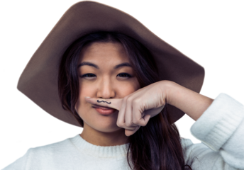 Asian woman with mustache on finger posing for the camera