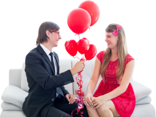 Cute geeky couple with red balloons