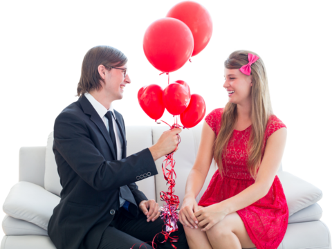 Cute geeky couple with red balloons 