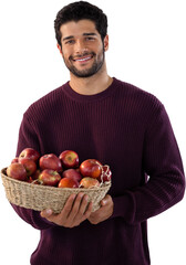 Portrait of man holding basket with apples