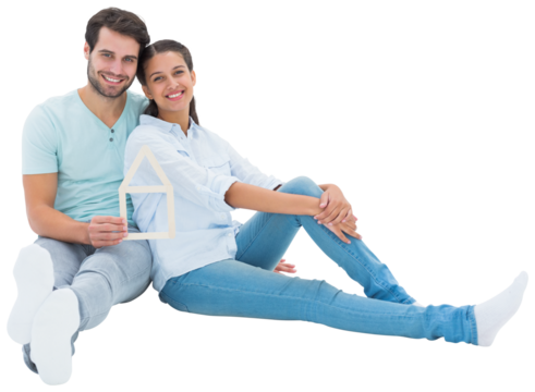 Cute couple sitting holding a house shape