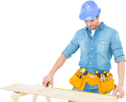 Carpenter measuring wooden plank