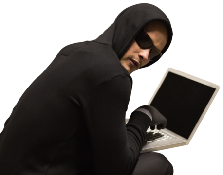 Hacker using laptop to steal identity
