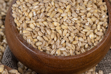 Cheap tasteless barley porridge close-up