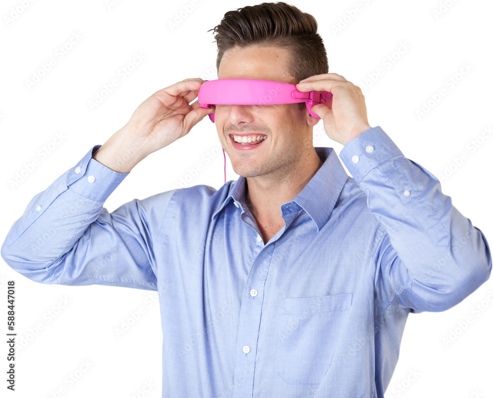 Poster smiling young man gesturing while using virtual reality glasses