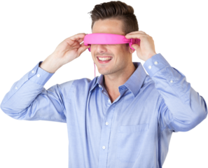 Smiling young man gesturing while using virtual reality glasses