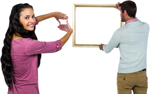 Smiling couple with picture frame