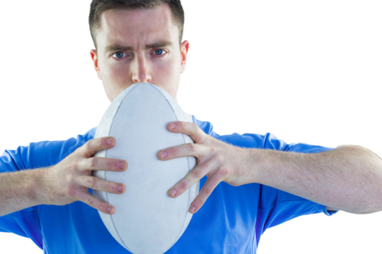 Rugby player holding a rugby ball