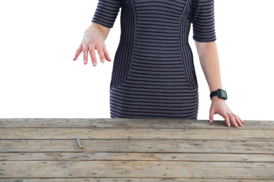 Mid section of businesswoman holding invisible product