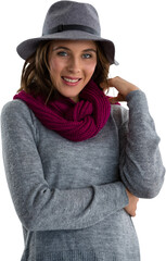 Portrait  of smiling young woman in hat and scarf