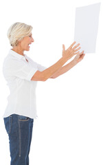 Angry woman shouting at piece of paper